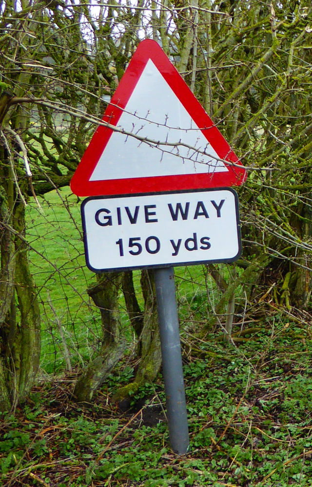 Give Way road sign in Wark village, Carham parish, Northumberland